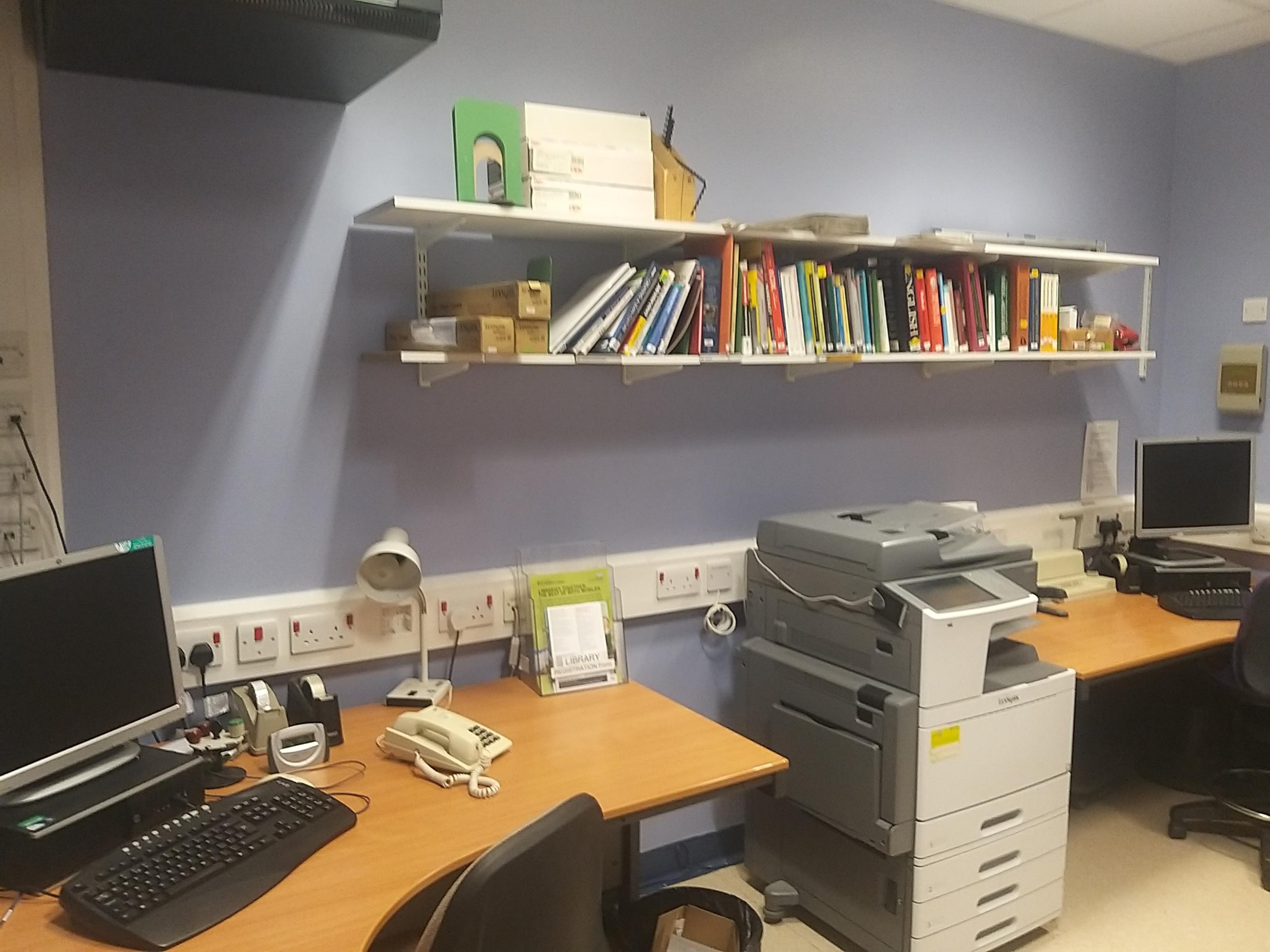 Photo of Wharfedale Library - Small office space with two pcs against wall pictured.